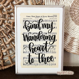 Come Thou Fount of Every Blessing hymn sign with the hand lettered lyrics of "Bind my Wandering Heart to Thee"