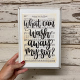 hand lettered christian wood sign that read "what can wash away my sin?"